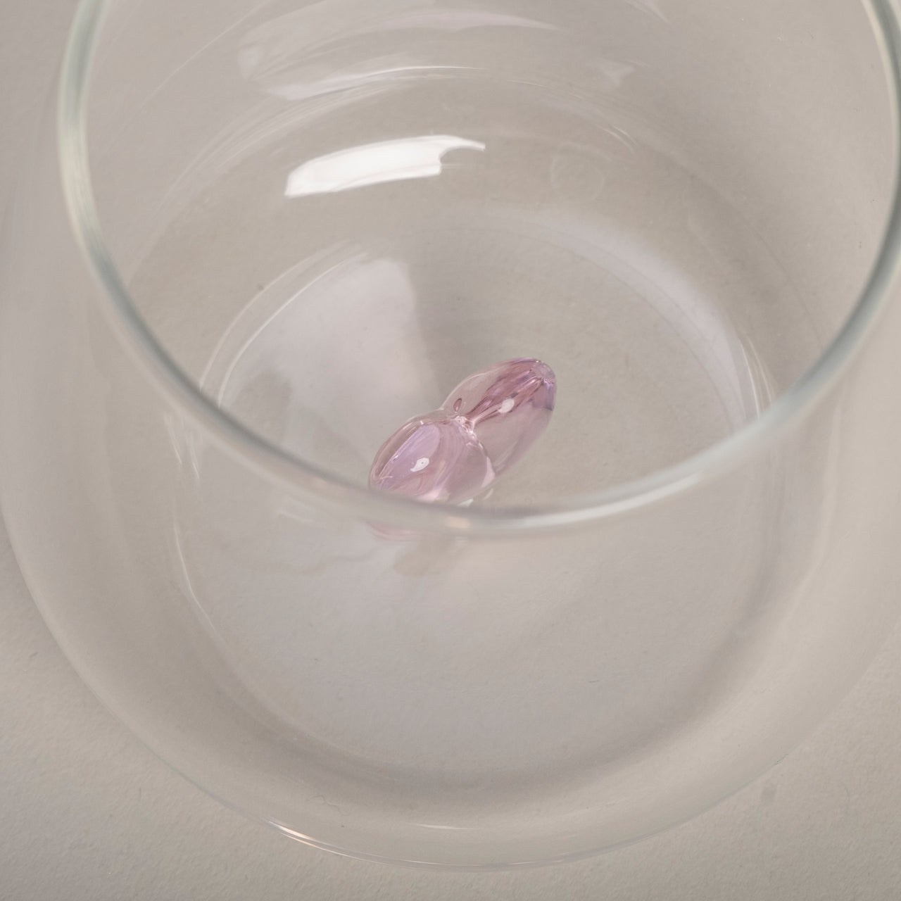 Trinkglas Herzfigur rosa