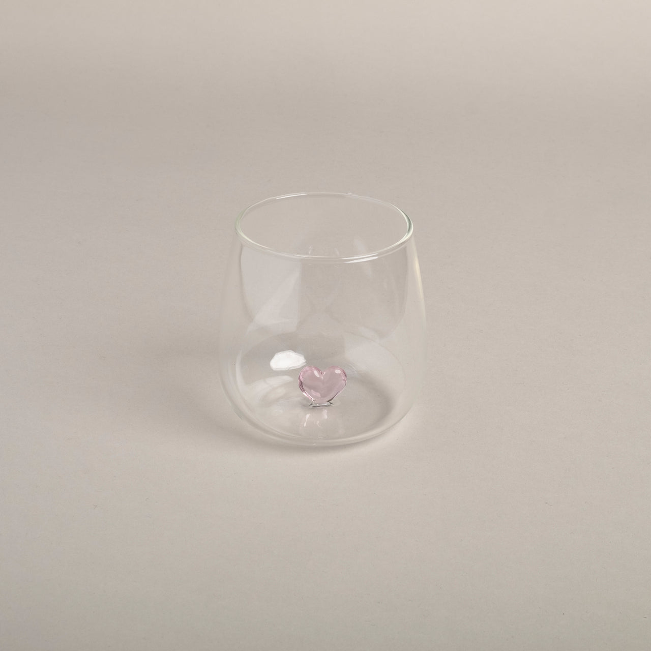 Trinkglas Herzfigur rosa