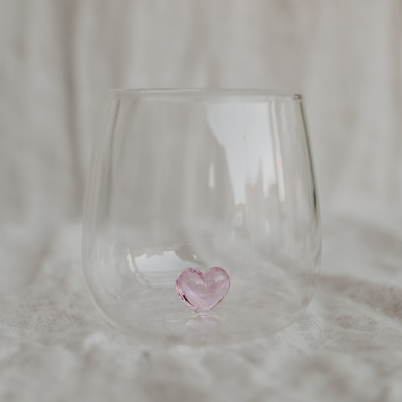 Trinkglas Herzfigur rosa