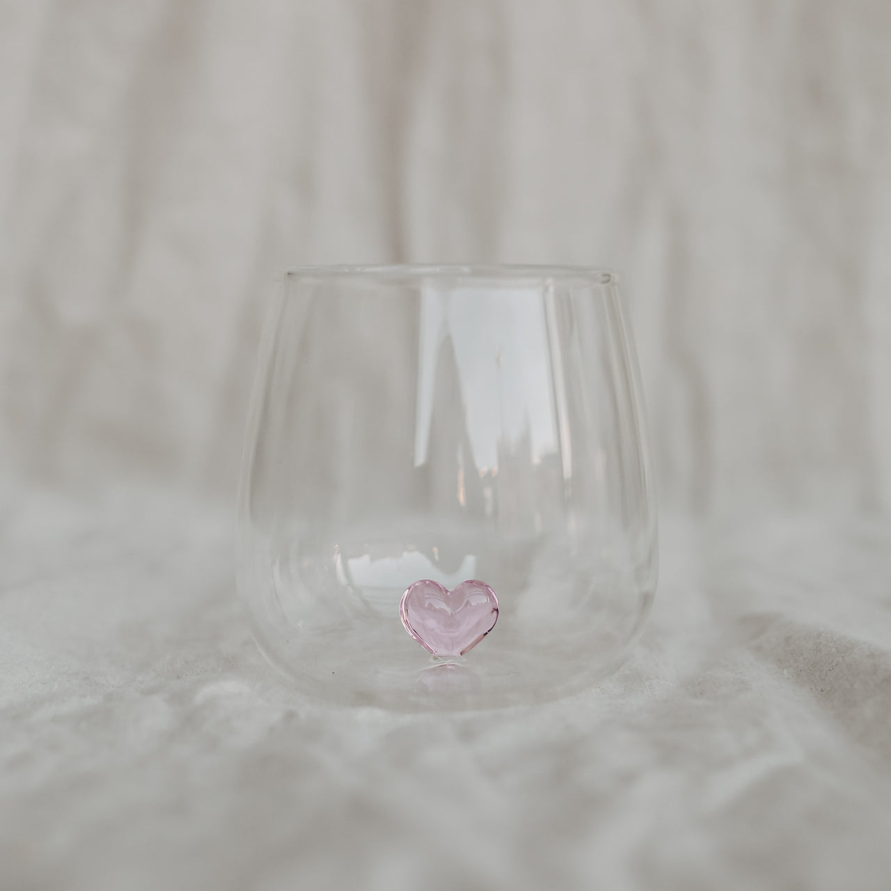 Trinkglas Herzfigur rosa